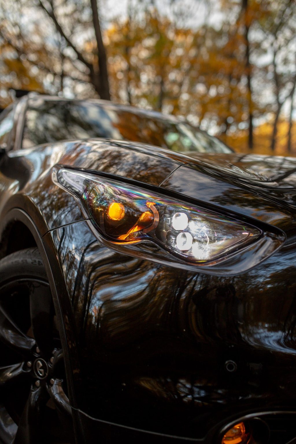 QX70 front three quarter view with EVO TRI DRLs lit
