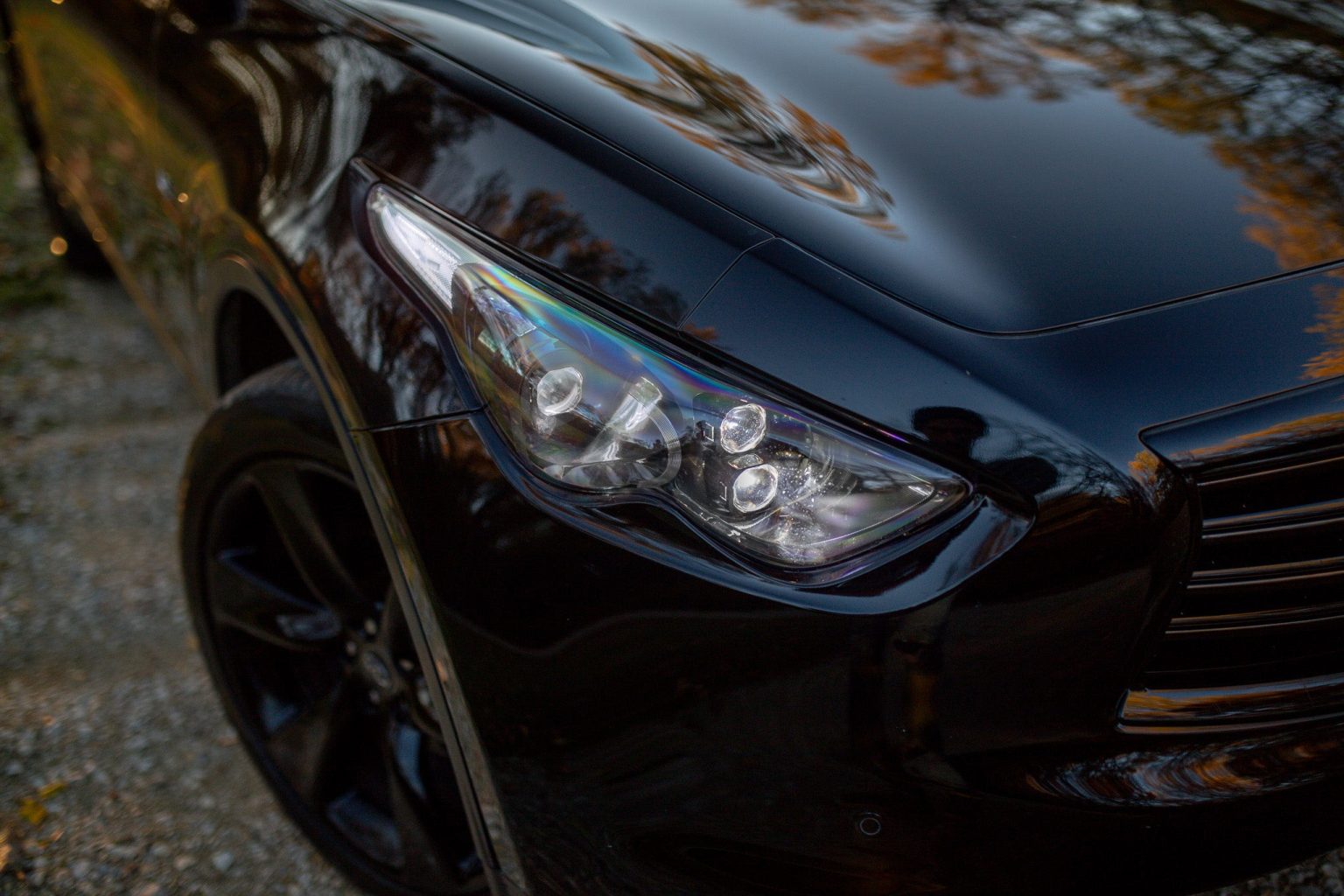 Close up of an EVO TRI headlight showing three bi-LED projectors inside the S51 housing shared by the QX70, FX35, FX37 and FX50