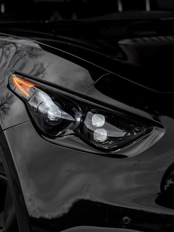 EVO TRI headlight on a QX70 with the white DRL on